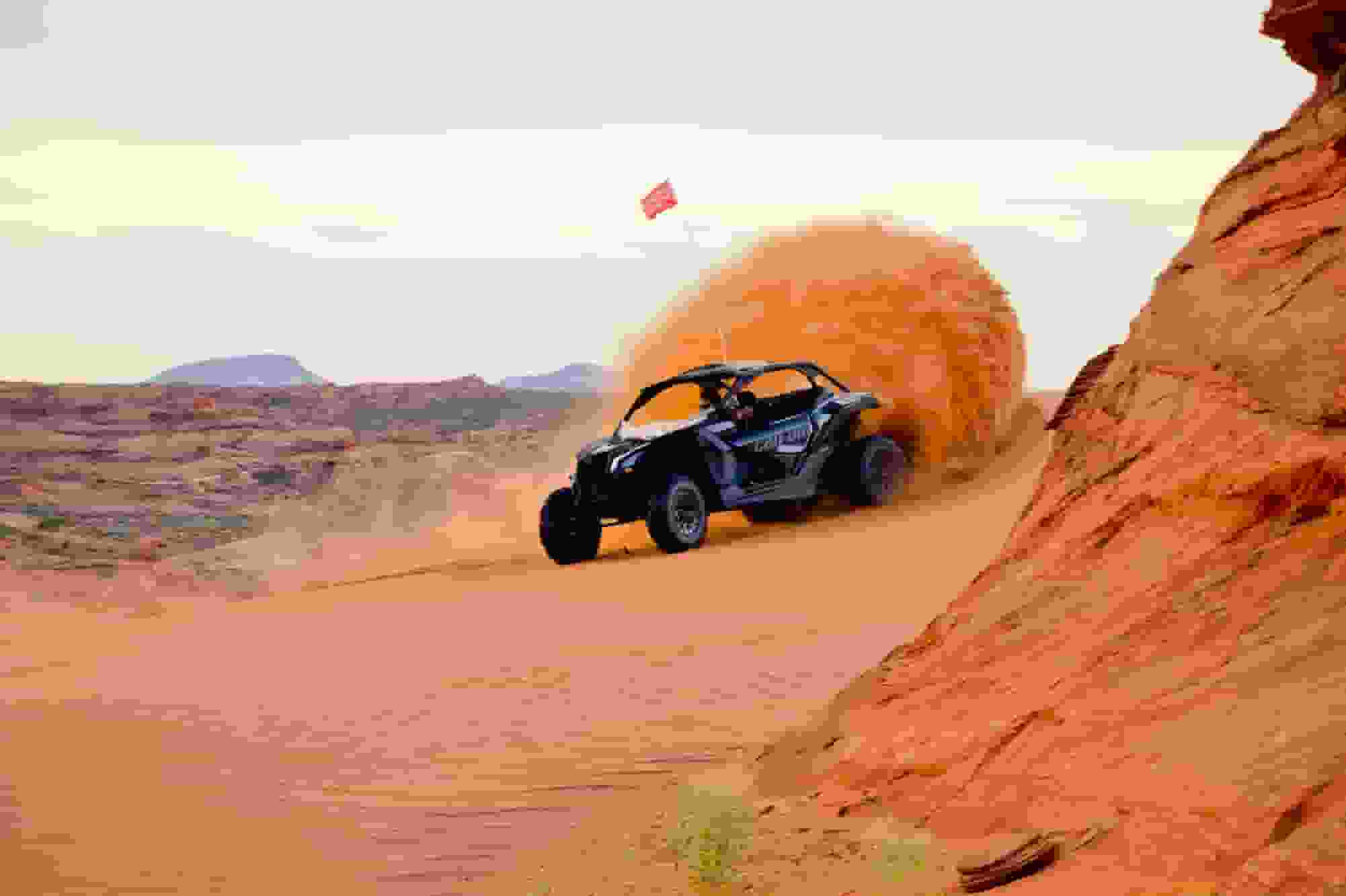 UTV throwing sand in the sandhollow reservation located in hurricane utah