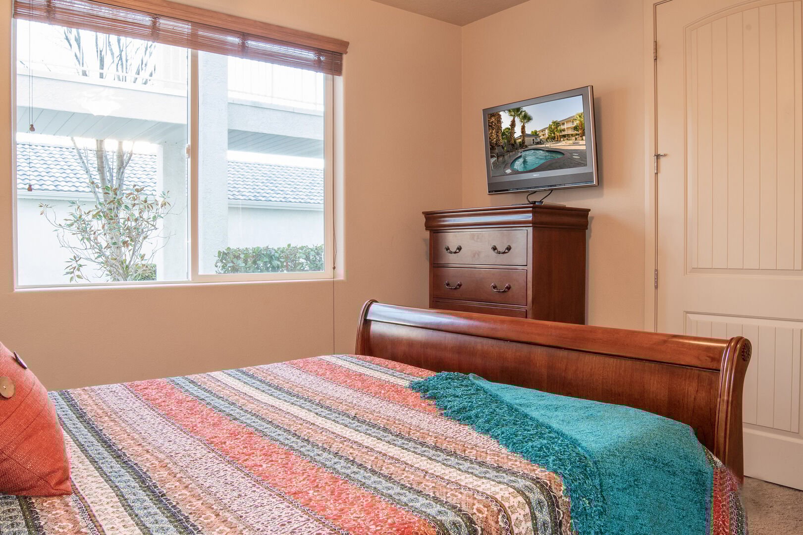 Bedroom 2 has a queen bed, elbow room & bathroom access